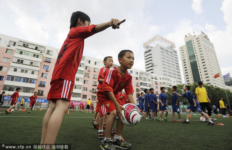 中国足球路在何方 回归本源让儿童体会快乐足