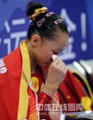 2009年9月17日，第十一届山东全运会体操女子团体决赛在济南奥体中心进行。上海队最后一项出色发挥夺...